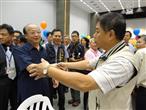 廖貴福理事長與胡志強市長握手致意